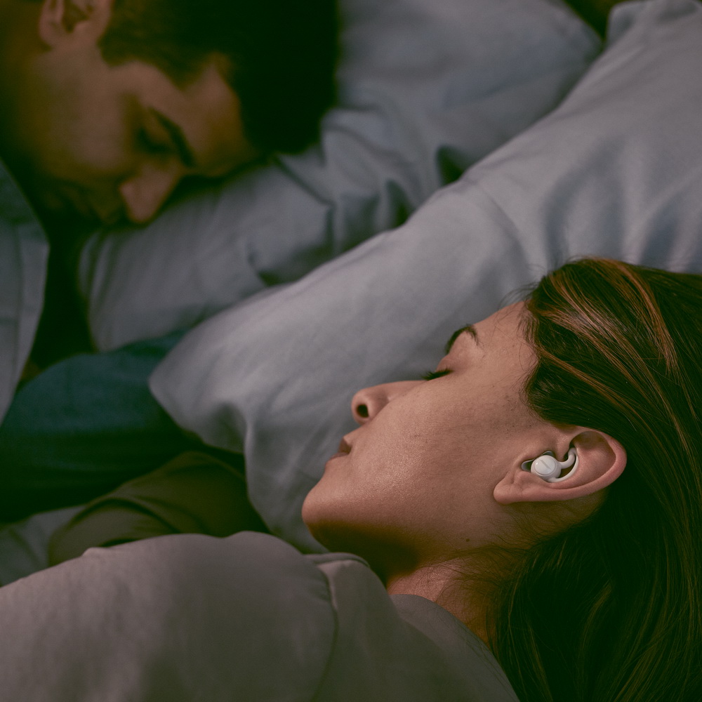 Bose_noise-masking_sleepbuds_close up couple sleep.jpg